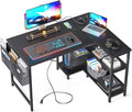 ODK 40 Inch Small L Shaped Gaming Computer Desk with Power Outlets, Reversible Storage Shelves & PC Stand for Home Office, Simple Writing Study Table with Storage Bag for Small Space, Black
