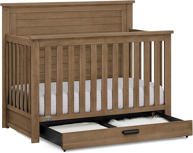 Delta Children Simmons Kids Caden 6-in-1 Convertible Crib with Trundle Drawer, Greenguard Gold Certified, Aged Oak