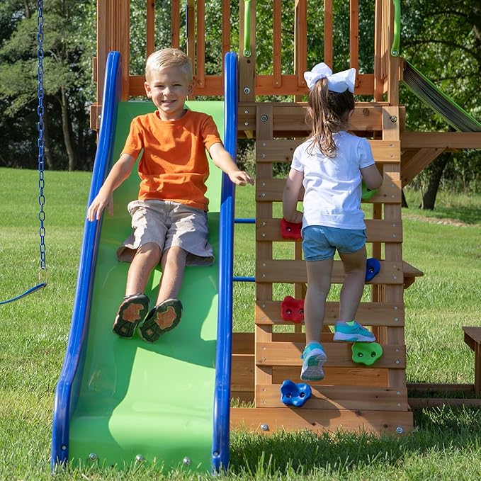 Backyard Discovery Beach Front Cedar Wood Swing Set with Wave Slide, Play Deck, Monkey Bars, Rock Wall Ladder, Shaded Picnic Area, Snack Bar, Belt Swings, Trapeze, Sandbox Area, Outdoor Playset