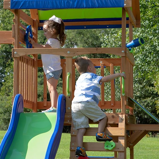 Backyard Discovery Beach Front Cedar Wood Swing Set with Wave Slide, Play Deck, Monkey Bars, Rock Wall Ladder, Shaded Picnic Area, Snack Bar, Belt Swings, Trapeze, Sandbox Area, Outdoor Playset