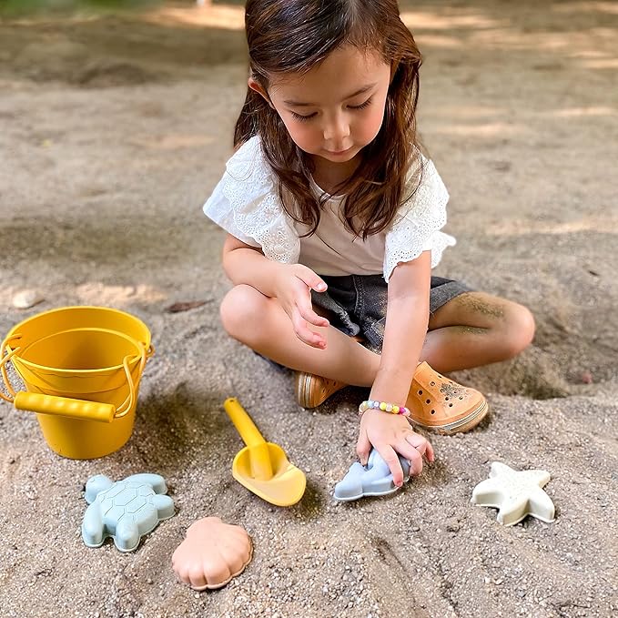 BLUE GINKGO Silicone Beach Toys - Modern Baby | Travel Friendly Toys Set | Silicone Bucket, Shovel, 4 Sand Molds, Beach Bag | Sand Toys for Toddlers, Kids - Yellow